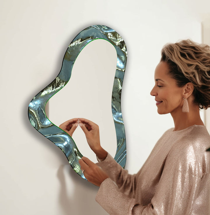 Mirror wall decor combining bold shapes and reflective surfaces to create a striking focal point
