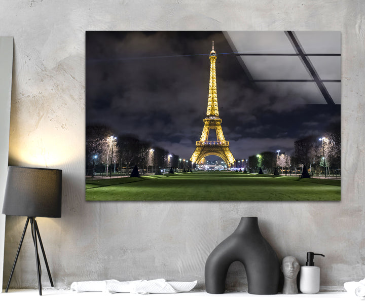 Eiffel Tower at Night: Illuminated Landmark on Glass Wall Art
