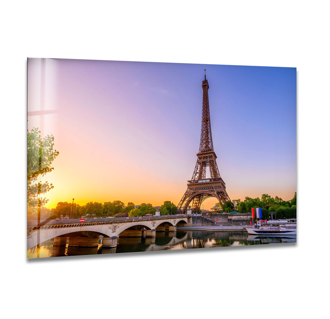 Eiffel Tower at Sunset: Iconic Landmark Illuminated on Glass Wall Art
