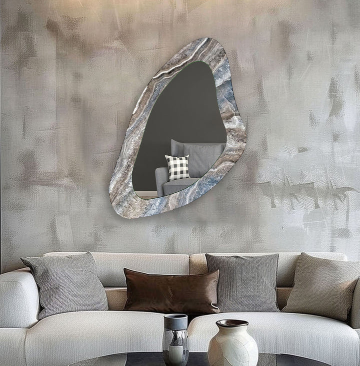 Mirror wall art inspired by geometric designs, adding sophistication to any decor style
