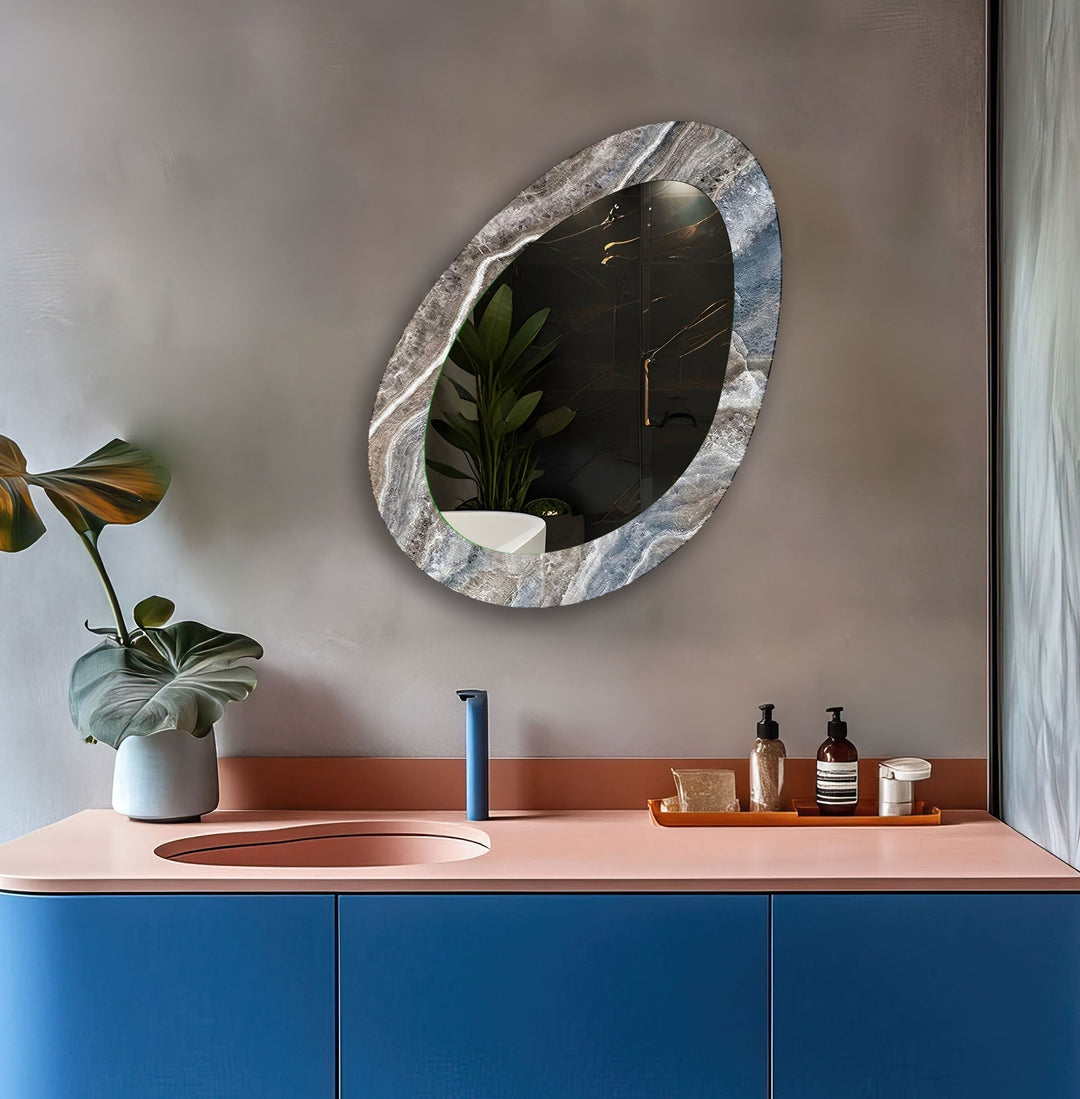 Mirror wall decor combining bold shapes and reflective surfaces to create a striking focal point
