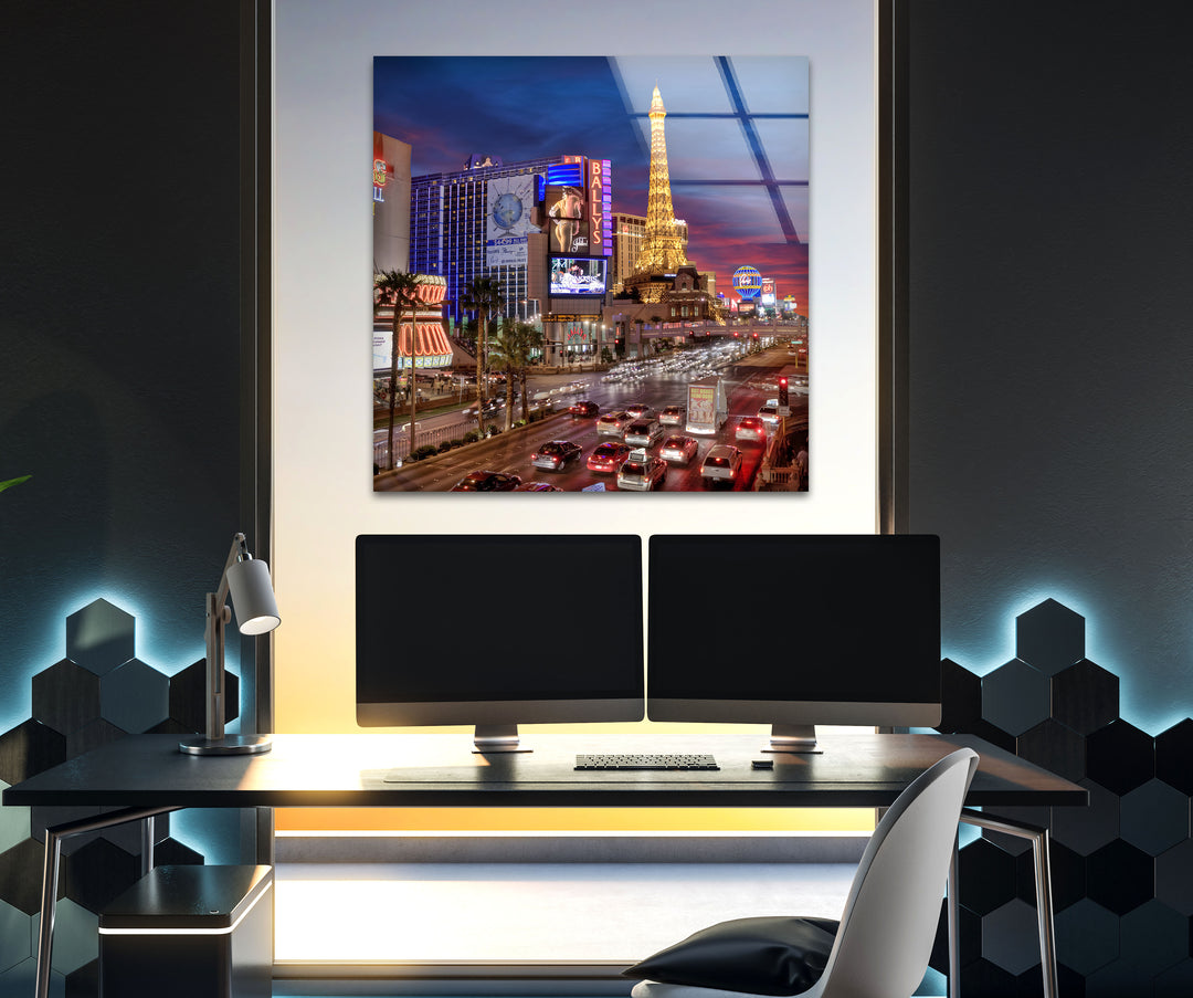 A breathtaking glass wall art showcasing the Las Vegas skyline at night with bright neon signs.
