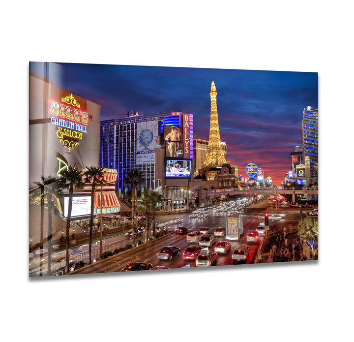 A stunning glass wall art of the vibrant Las Vegas Strip, featuring neon lights and bustling city life.
