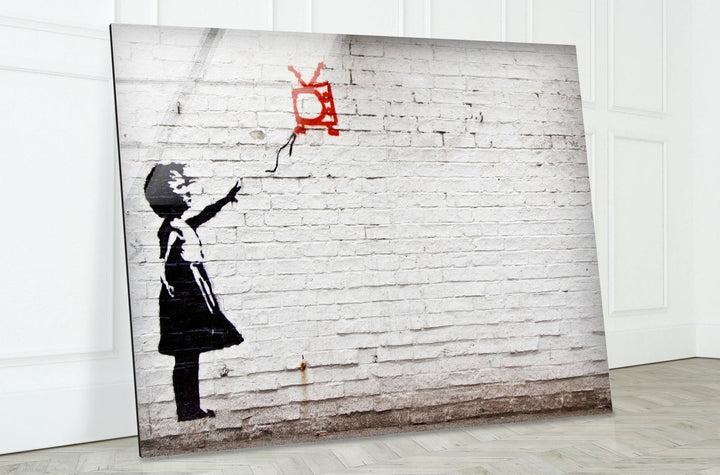 Banksy Kite Girl Tempered Glass Wall Art - Explore Banksy prints for sale and add a vibrant, artistic touch to any room. Our collection includes Banksy wall art, original art for sale, and more. Purchase Banksy art to enjoy high-quality prints and unique designs that bring life to your walls.