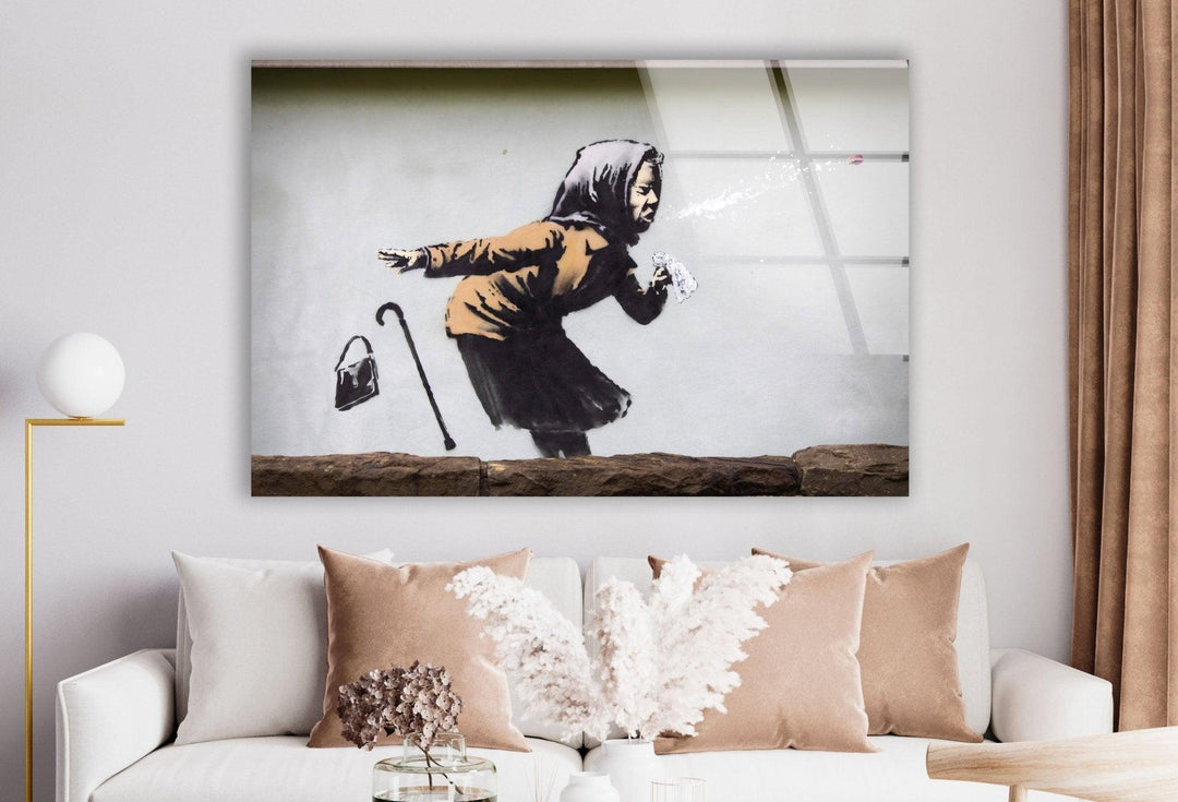 Banksy Sneezing Woman Glass Wall Art - Explore our collection today and discover the perfect Banksy artwork for sale that speaks to you. With our extensive range of Banksy prints, you are sure to find the ideal piece to complement your home decor. Elevate your space with the provocative and iconic style of Banksy, and make a statement with our exclusive glass wall art.