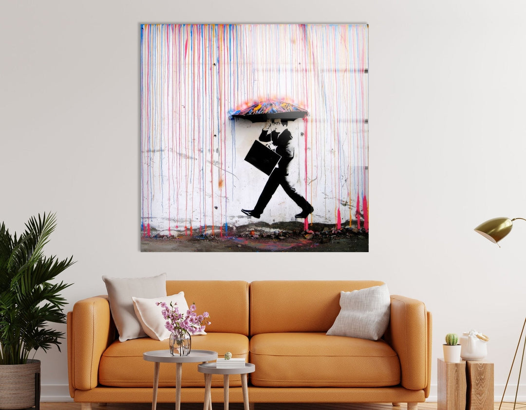 Banksy Umbrella Man Rainbow Rain Tempered Glass Wall Art  - Explore Banksy prints for sale and add a vibrant, artistic touch to any room. Our collection includes Banksy wall art, original art for sale, and more. Purchase Banksy art to enjoy high-quality prints and unique designs that bring life to your walls.