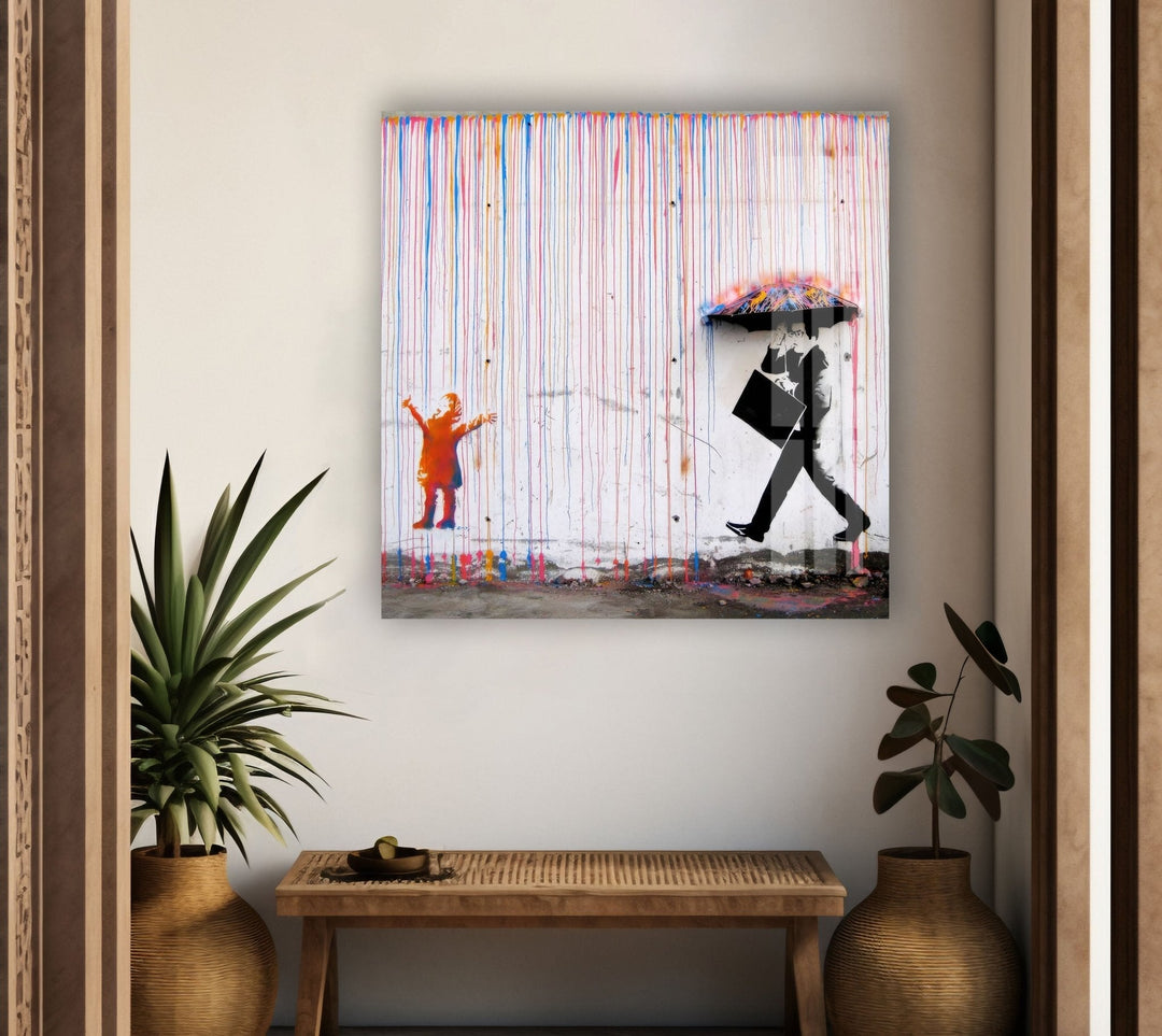 Banksy Umbrella Man Rainbow Rain Tempered Glass Wall Art - MyPhotoStation - Discover unique Banksy prints and elevate your home decor with the artist's iconic designs. Our collection of Banksy wall art and paintings for sale offers something for every taste. Purchase Banksy art today and bring contemporary flair to your walls.