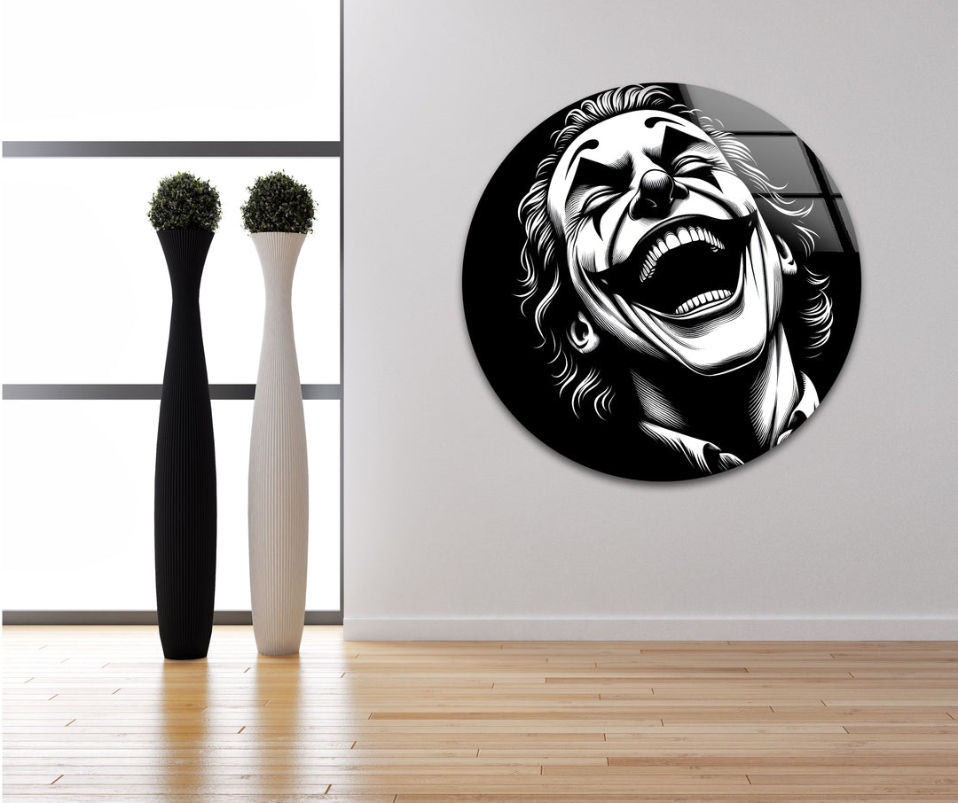 Bold black and white paintings of the Joker laughing adding character to contemporary decor
