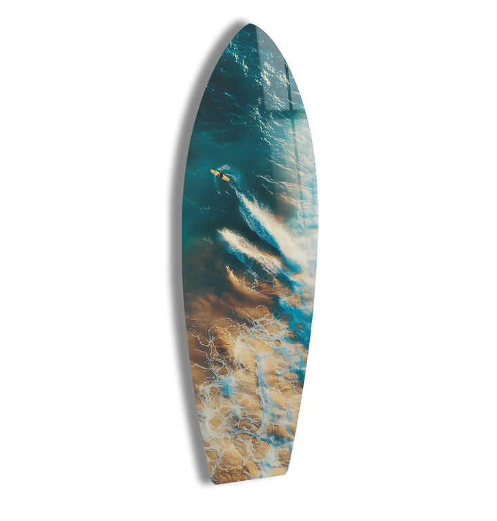 Surfer riding a wave, captured in dynamic glass wall art that brings the ocean to life.
