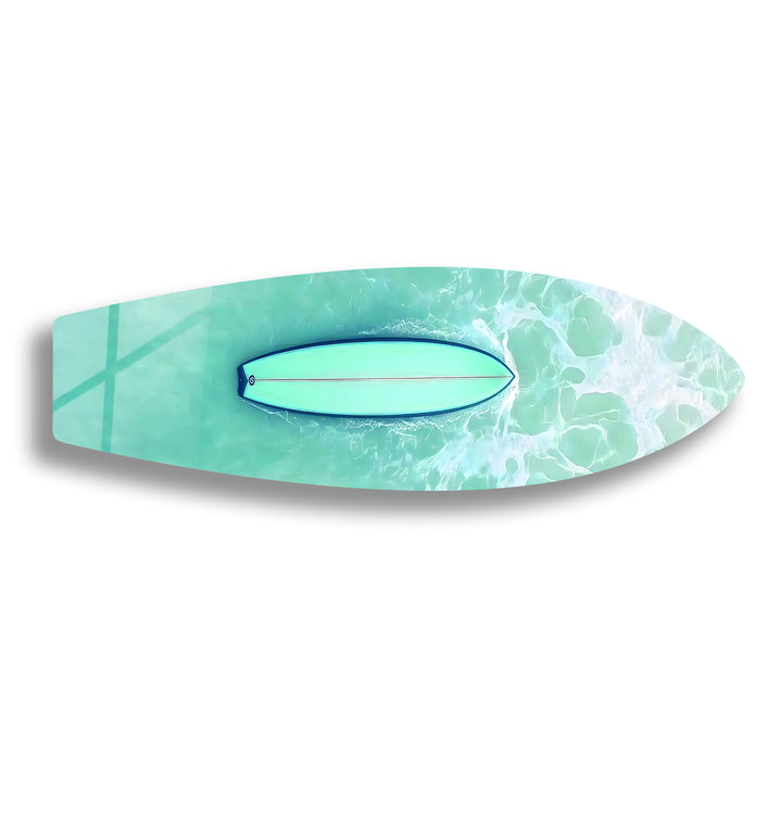 Aerial view of a paddleboarder gliding through clear turquoise waters, captured in stunning glass art.
