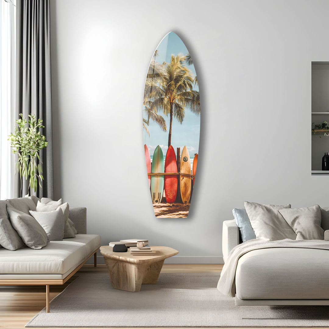 Coastal glass wall art featuring colorful surfboards and a serene ocean backdrop.
