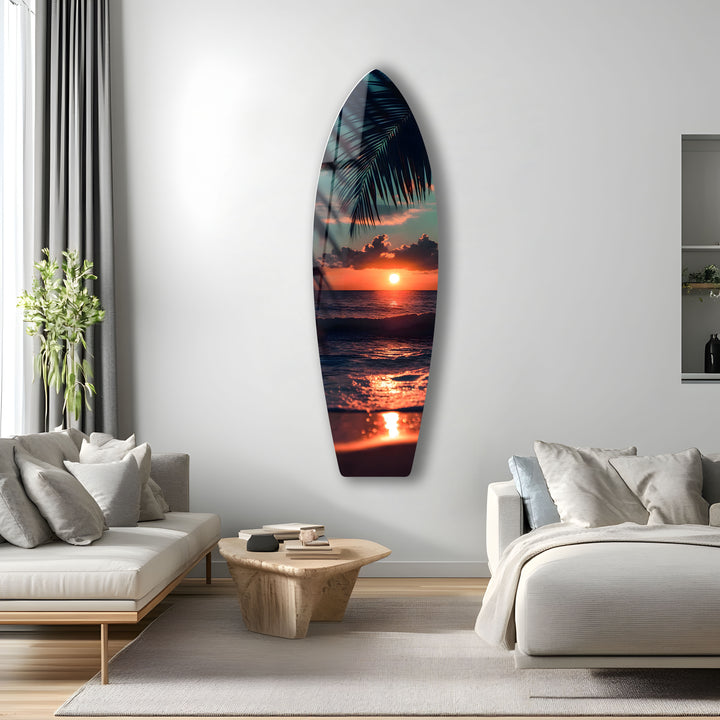 Sunset on the Beach: Capture the tranquil beauty of a coastal sunset with this glass wall art of a palm-framed ocean view.
