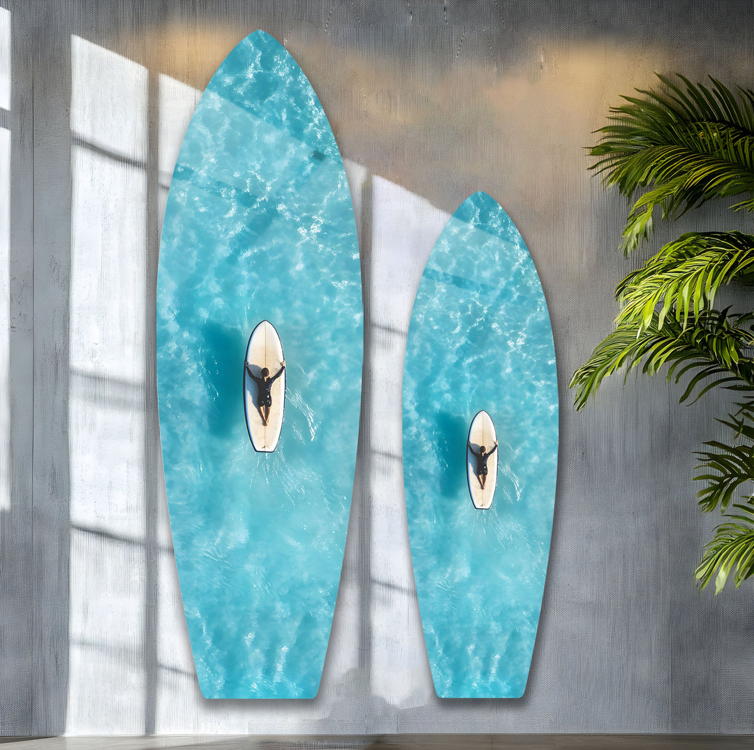 A surfer riding smooth ocean waves, beautifully printed on premium glass for a peaceful coastal feel.
