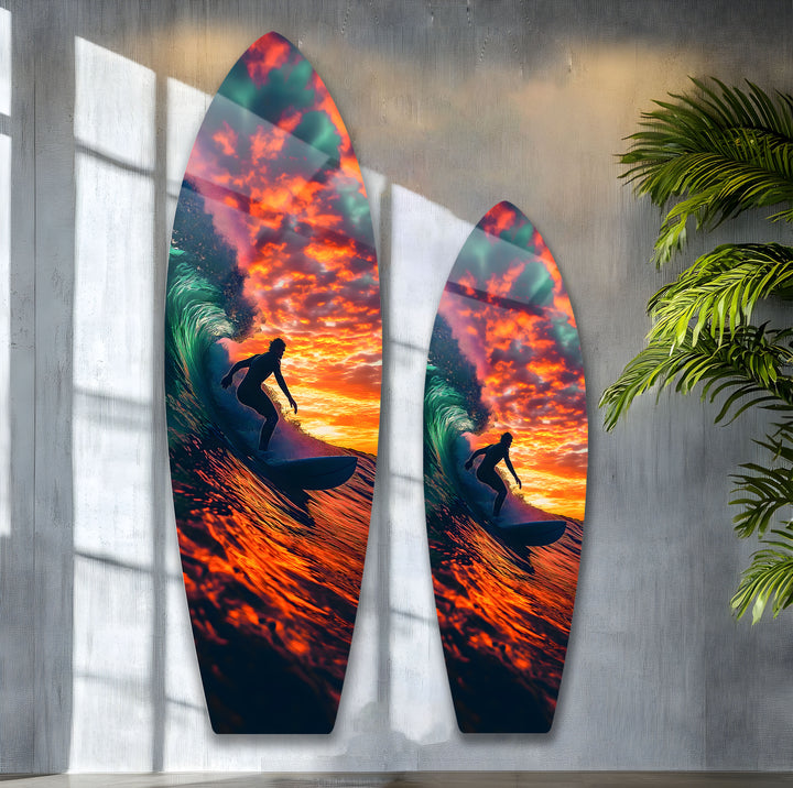 A surfer’s journey through the waves, beautifully captured with sunset hues on glass.
