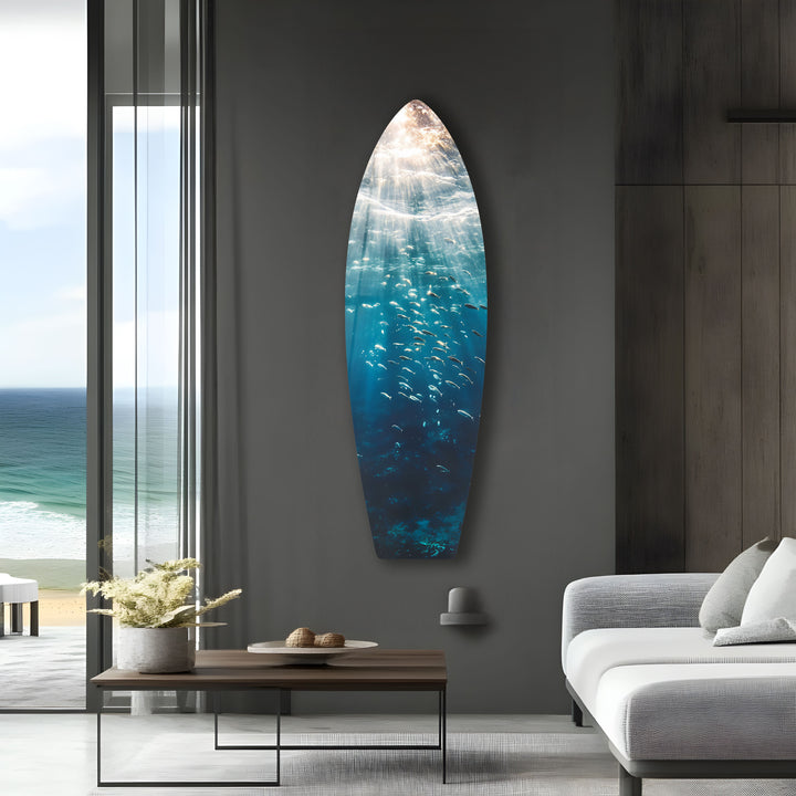 Elegant surfboard-shaped glass wall art with a captivating deep-sea view.
