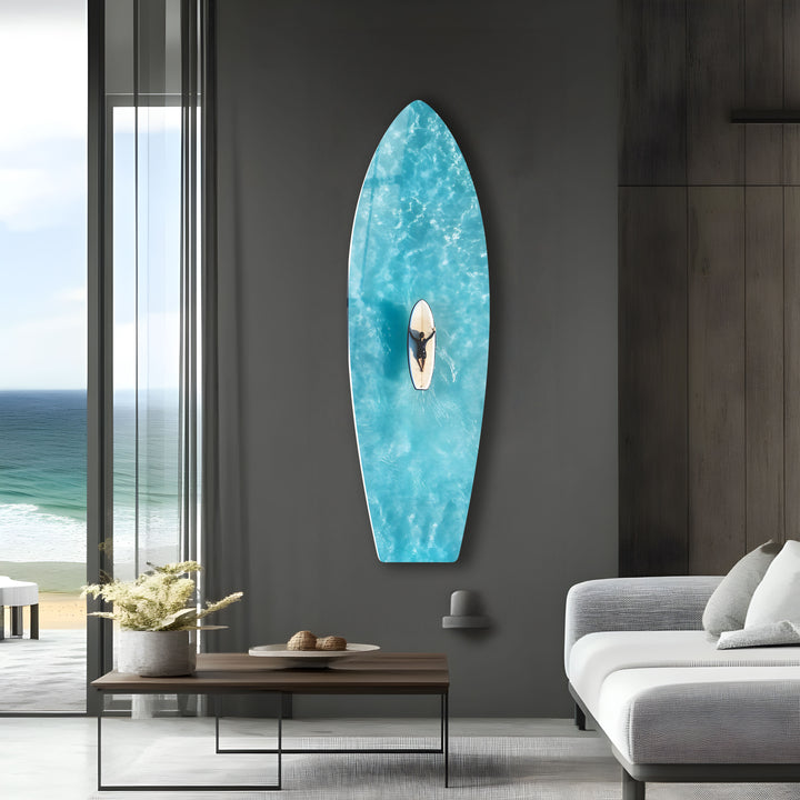 Tranquil beach vibes captured with a surfer riding peaceful waters, displayed in high-resolution glass art.
