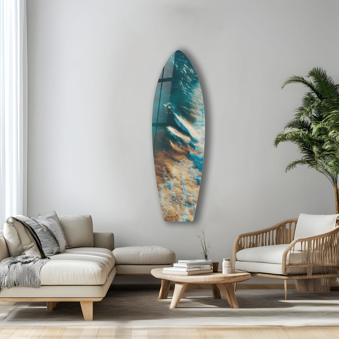 Surfer in action, surrounded by crashing waves, portrayed in stunning glass wall art.
