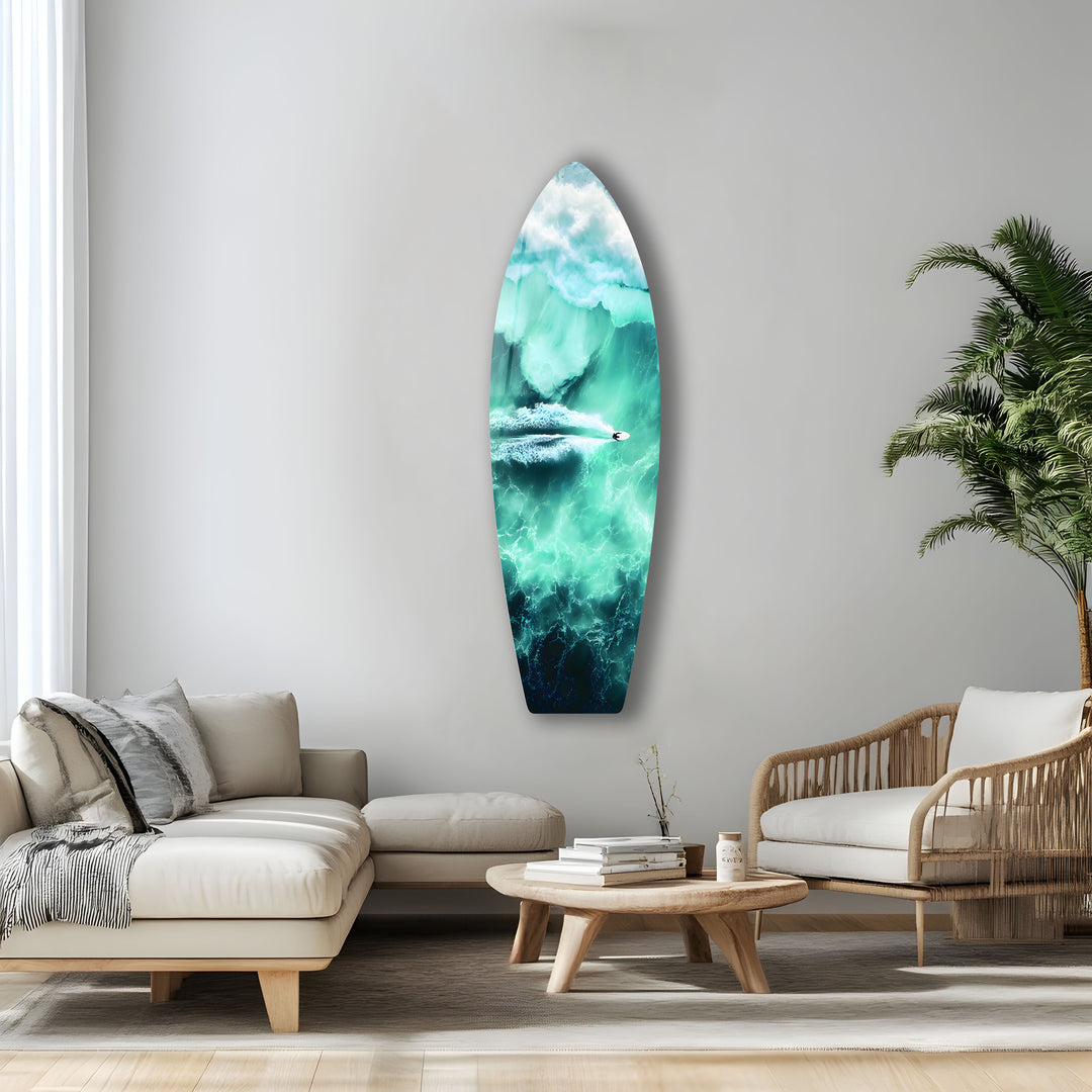 A paddleboarder enjoying the peaceful turquoise ocean, as seen from above, printed in stunning glass for your space.
