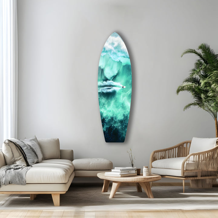 A paddleboarder enjoying the peaceful turquoise ocean, as seen from above, printed in stunning glass for your space.
