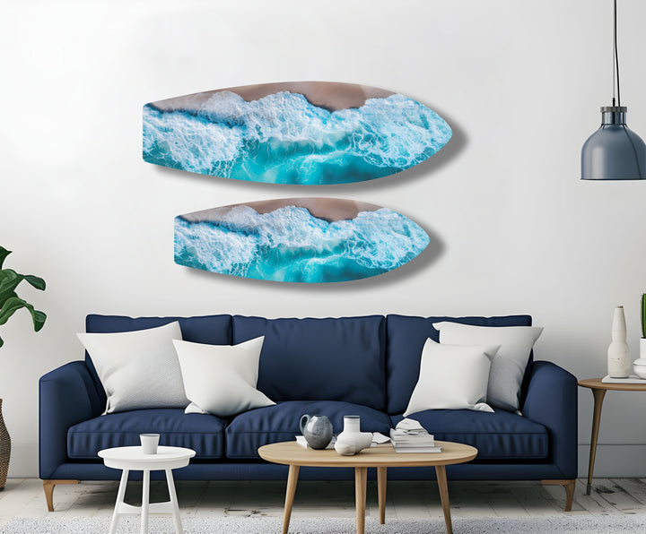 Stunning glass wall art with a unique aerial view of the powerful ocean waves.
