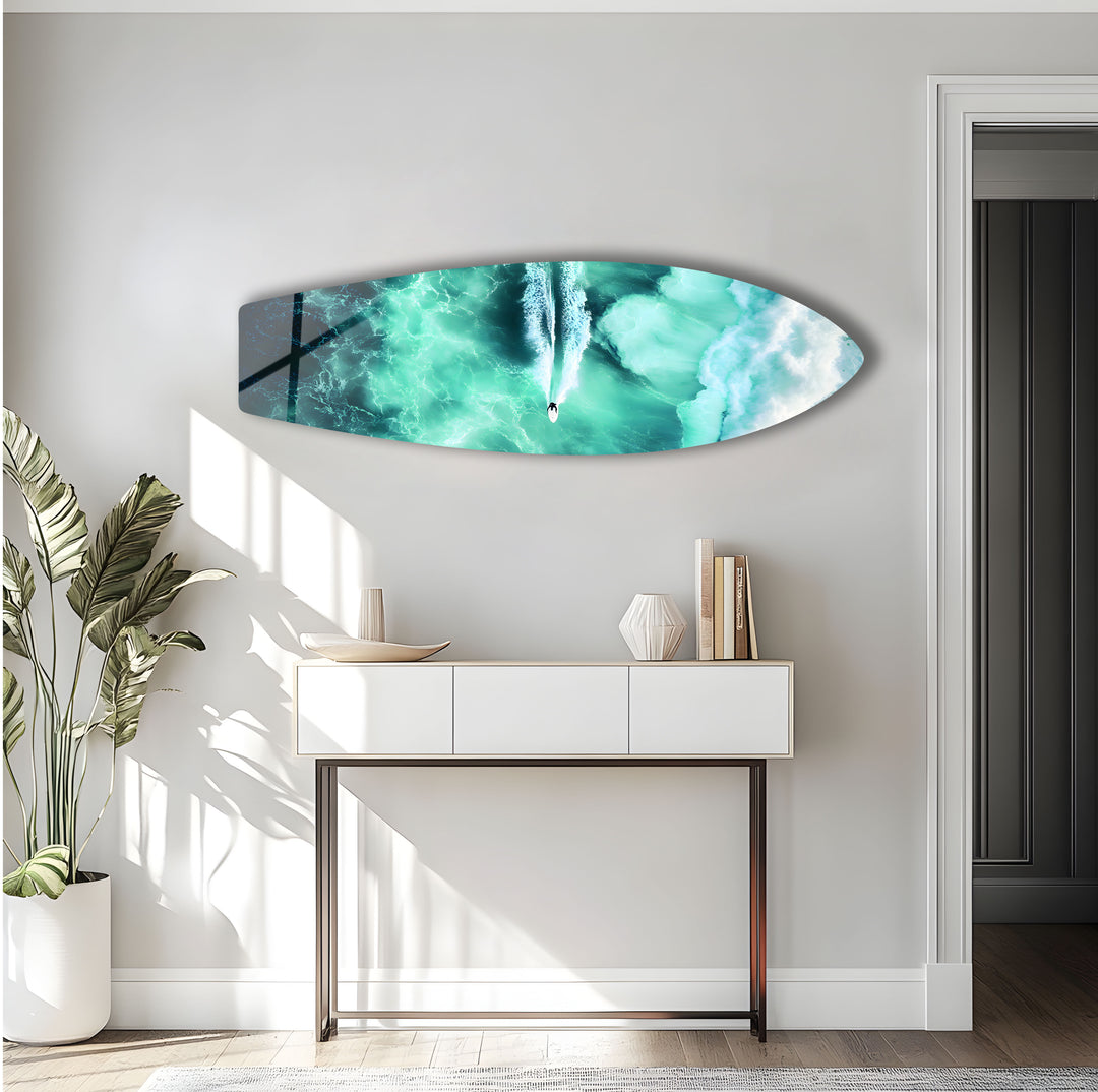 Paddleboarder in crystal-clear waters, captured from above, offering the ultimate beachside tranquility in glass art.
