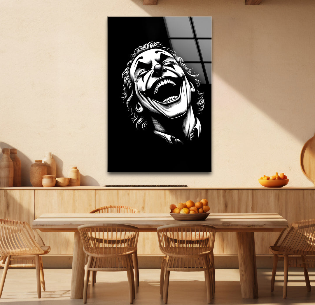 Striking black and white framed art of the Joker laughing with dramatic shading and contrasts
