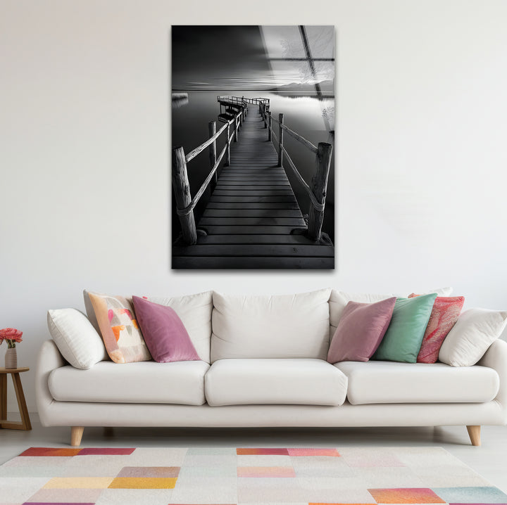 Unique black and white wall decor showcasing a dock in a dramatic and artistic composition
