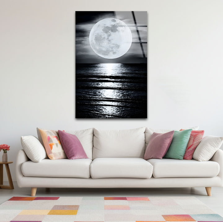 Unique black and white wall decor depicting the luminous beauty of the moon over a reflective sea.