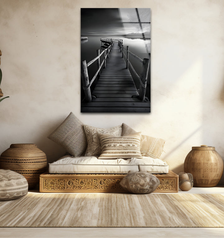 Chic black and white wall art of a dock extending into the water ideal for modern interiors
