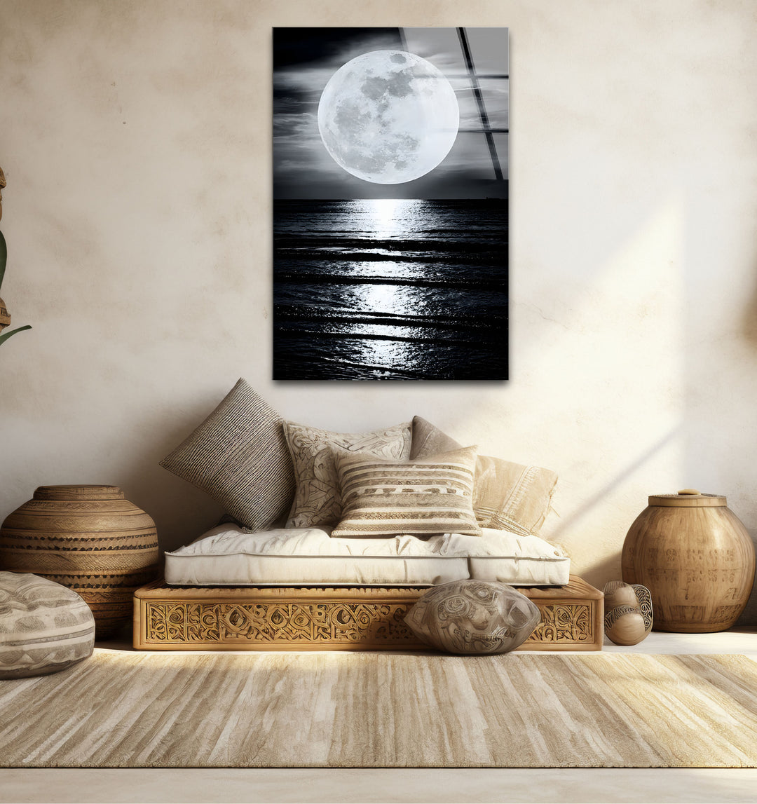 Timeless black and white wall art highlighting the elegance of a moonlit ocean view under dramatic clouds.