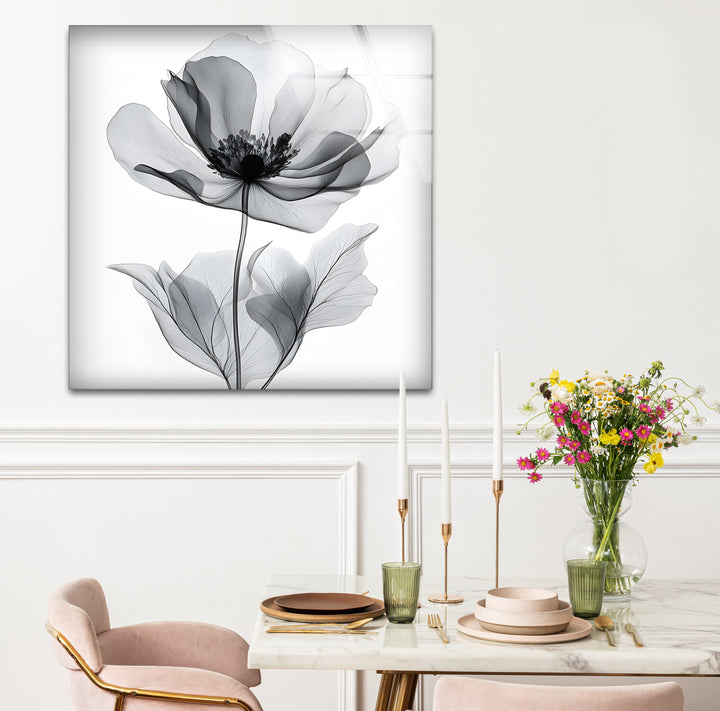 Sophisticated black and white framed art capturing the elegance of a flower in a timeless watercolor design
