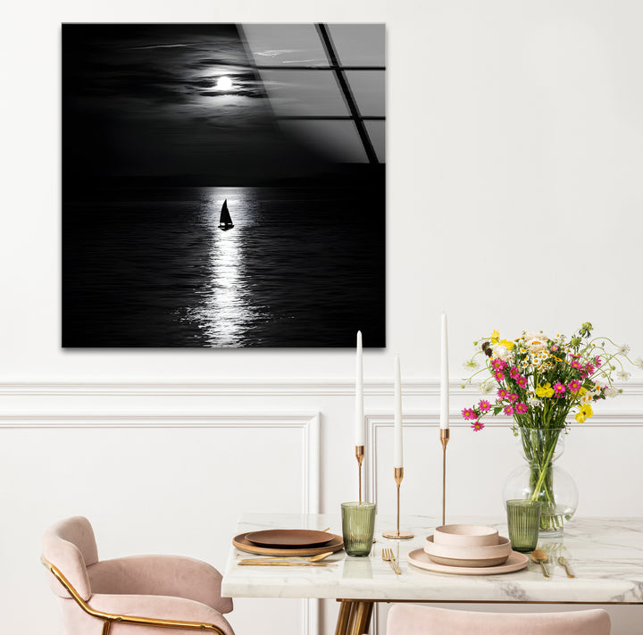 Stylish black and white framed art capturing the subtle glow of moonlight over a quiet scene.