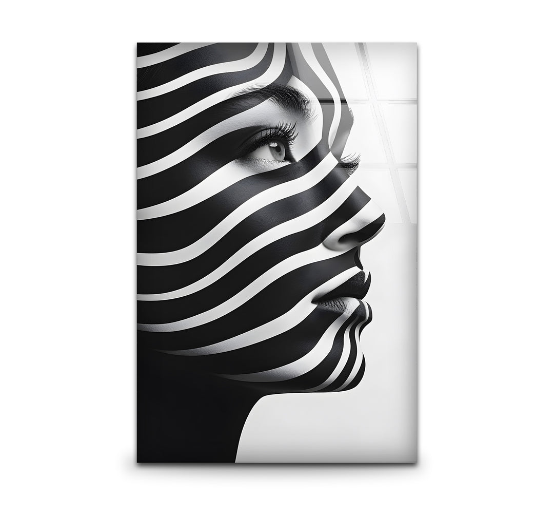 Black and white art featuring an elegant silhouette of a woman in a minimalist design
