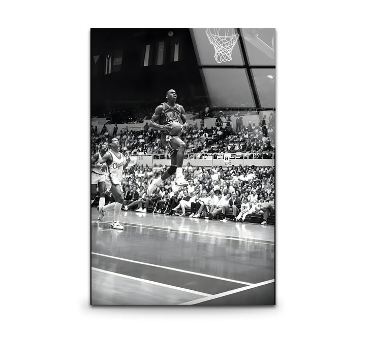 Dynamic black and white wall art featuring an iconic portrait of Michael Jordan in action.