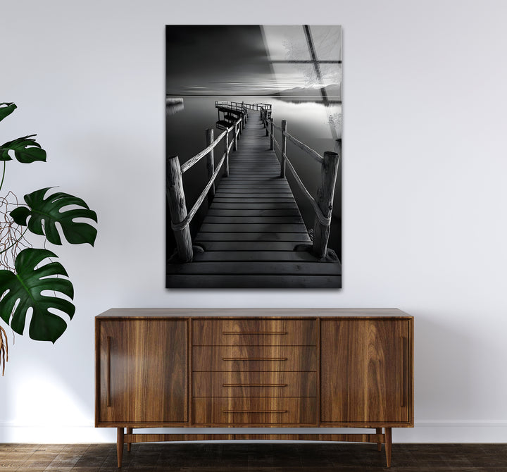 Captivating black and white wall decor featuring a dock scene surrounded by still waters
