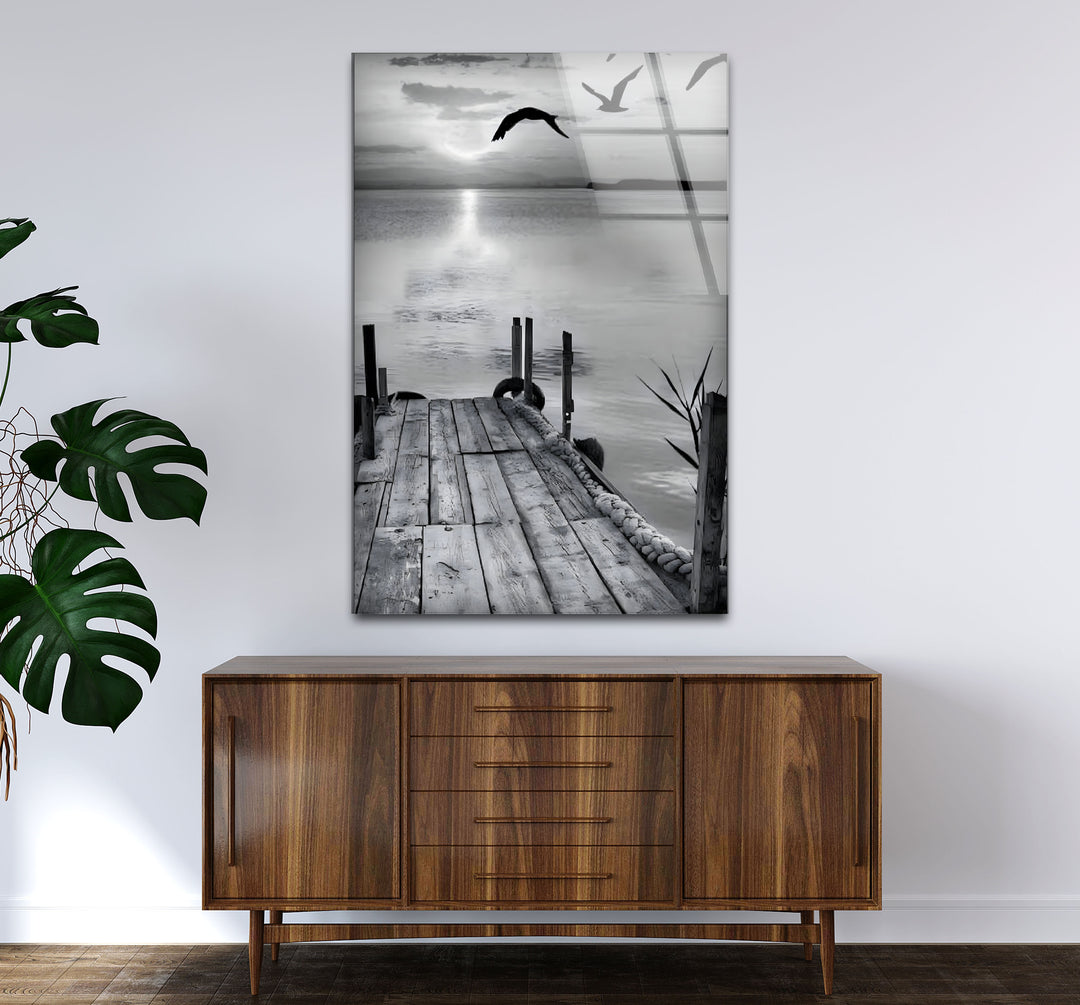 Artistic black and white abstract art capturing the simplicity and beauty of a lakeside dock.