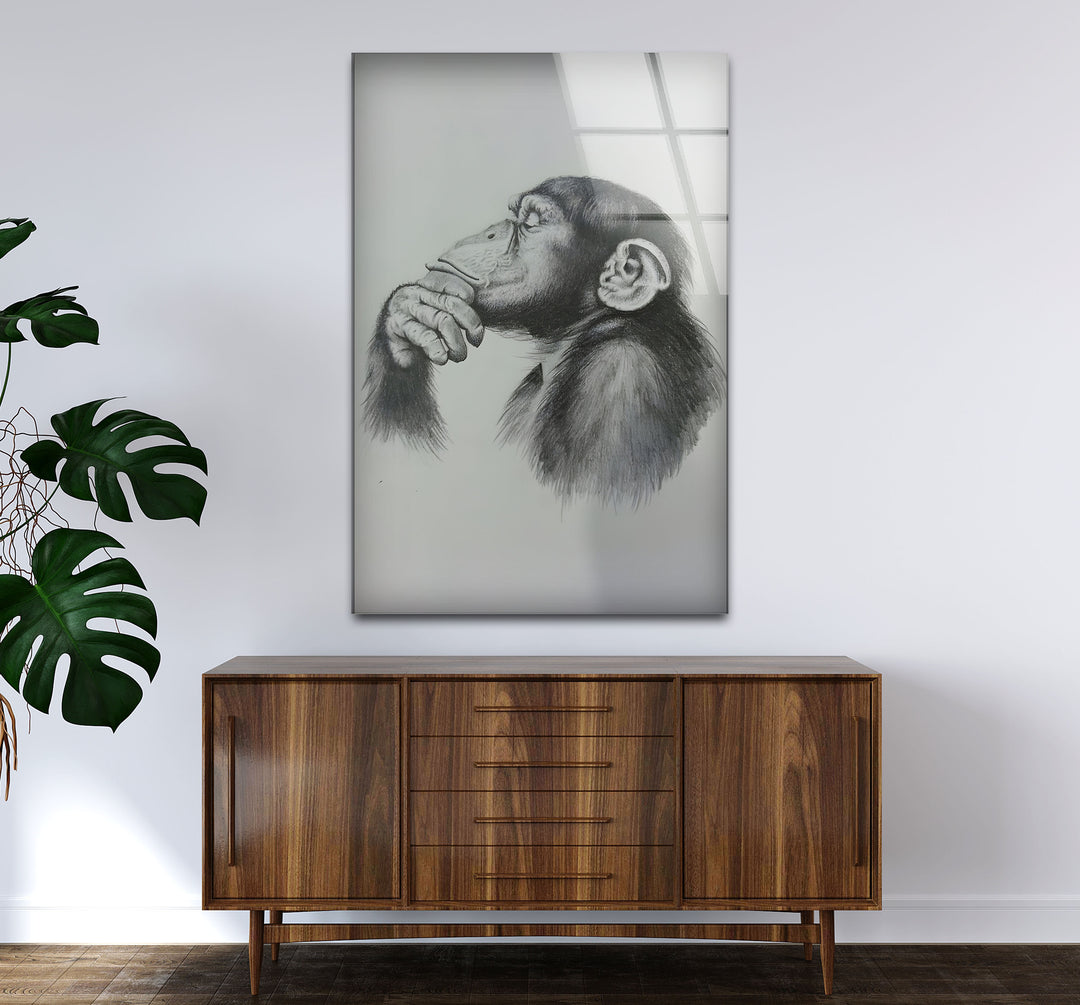 Sophisticated black and white wall decor with a whimsical monkey illustration.