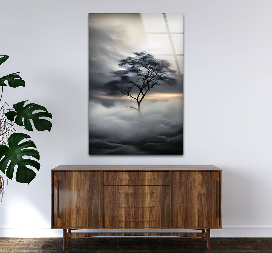 Modern black and white wall decor highlighting a single tree surrounded by a dreamlike atmosphere.