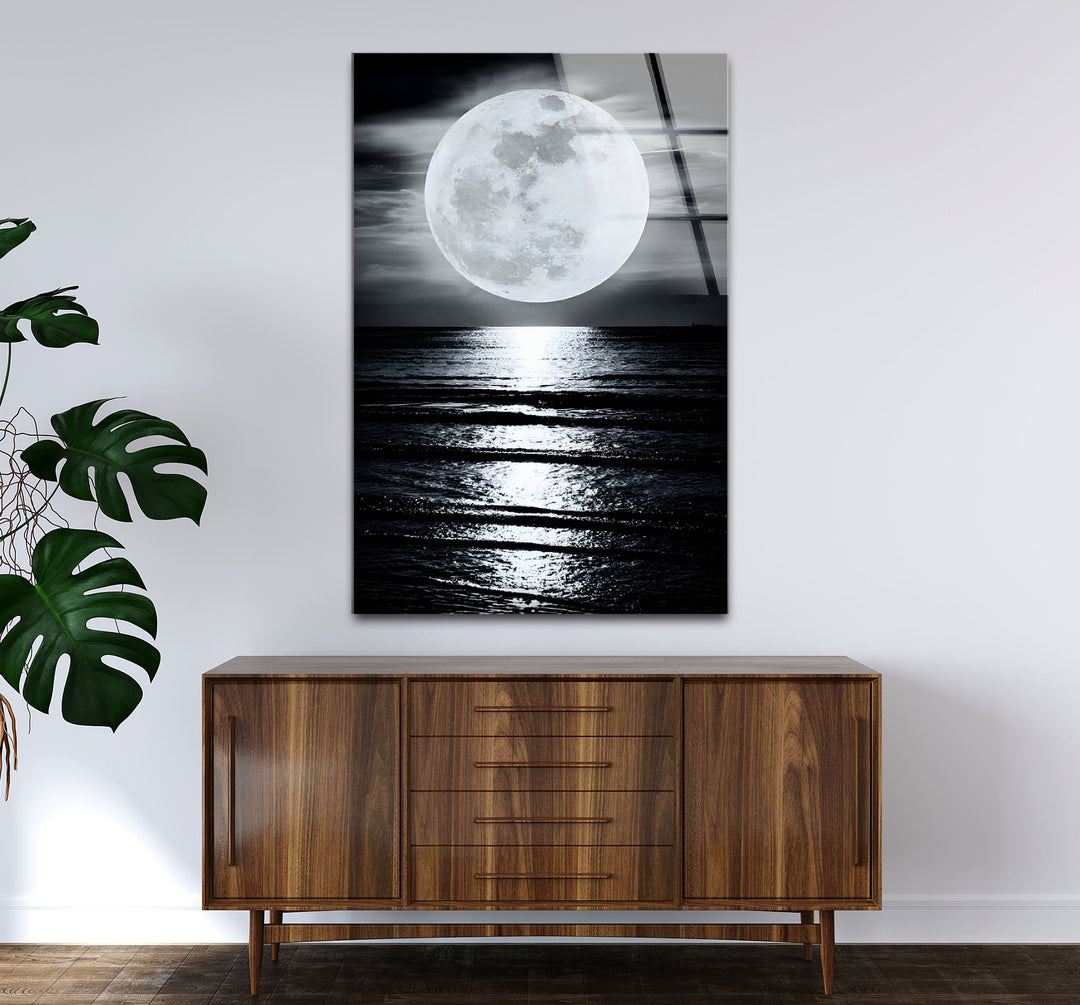 Sophisticated black and white wall decor showcasing a peaceful moon and its reflection on calm waves.