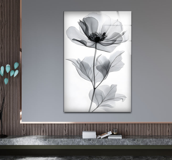 Stylish black and white wall art showcasing an elegant flower design in a watercolor style
