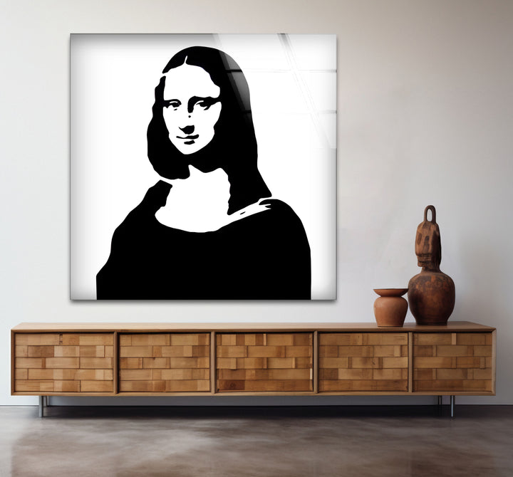 Chic black and white wall art of the Mona Lisa, ideal for creating a statement piece in minimalist interiors.