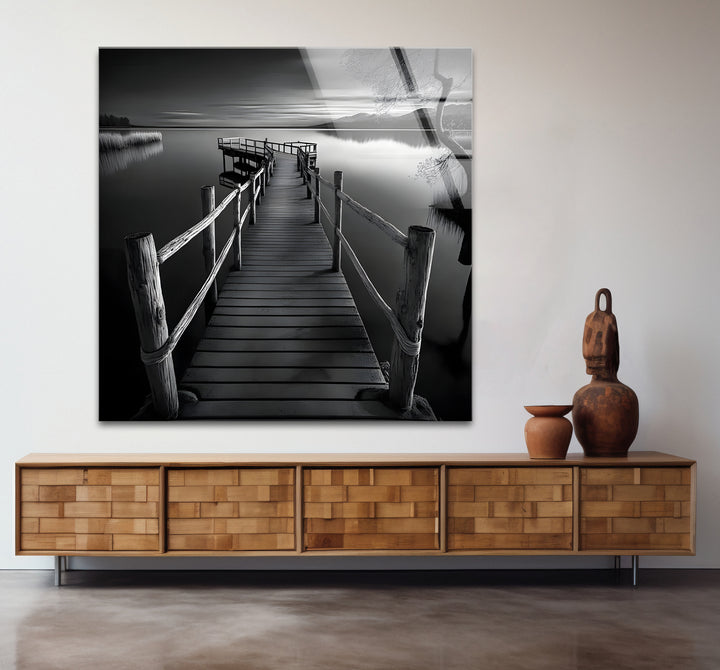 Modern black and white artwork highlighting the tranquility of a dock in a minimalist design
