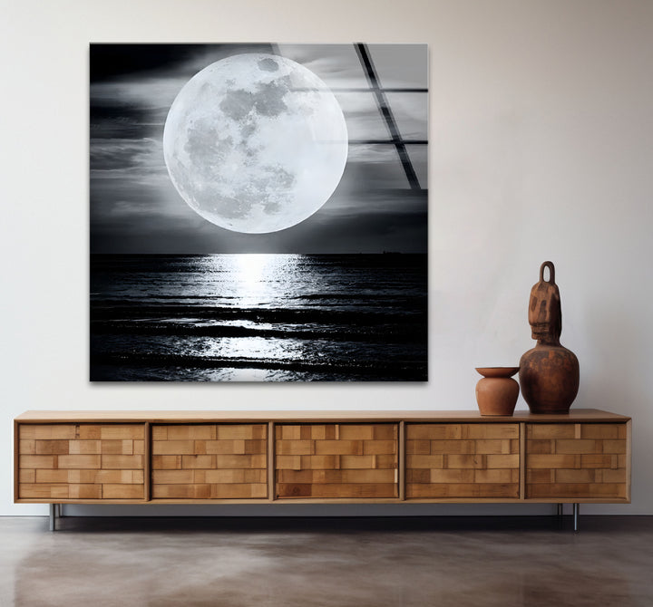 Modern black and white paintings of a moonlit horizon, perfect for adding depth and sophistication to any room.