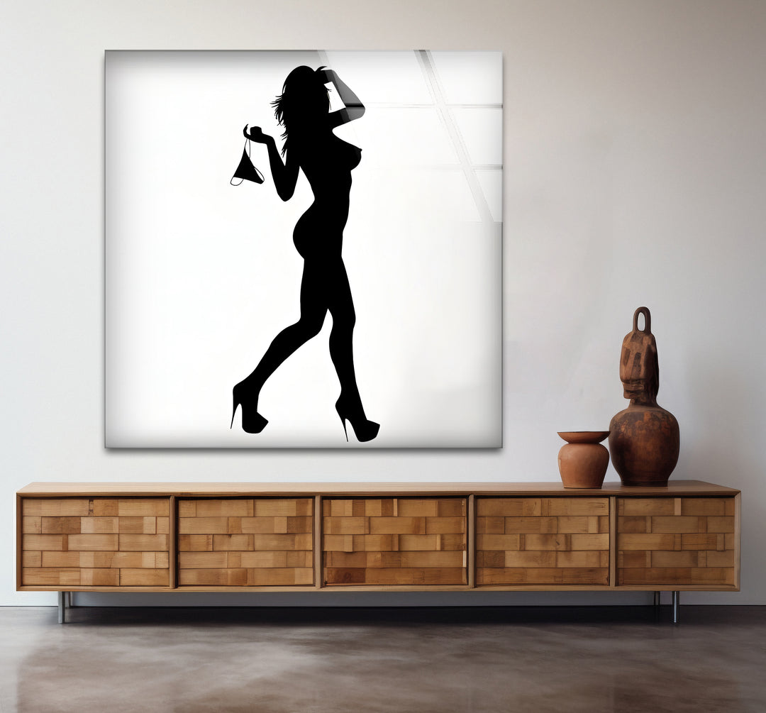 Modern glass wall art with a blend of erotic and sexy artistic elements
