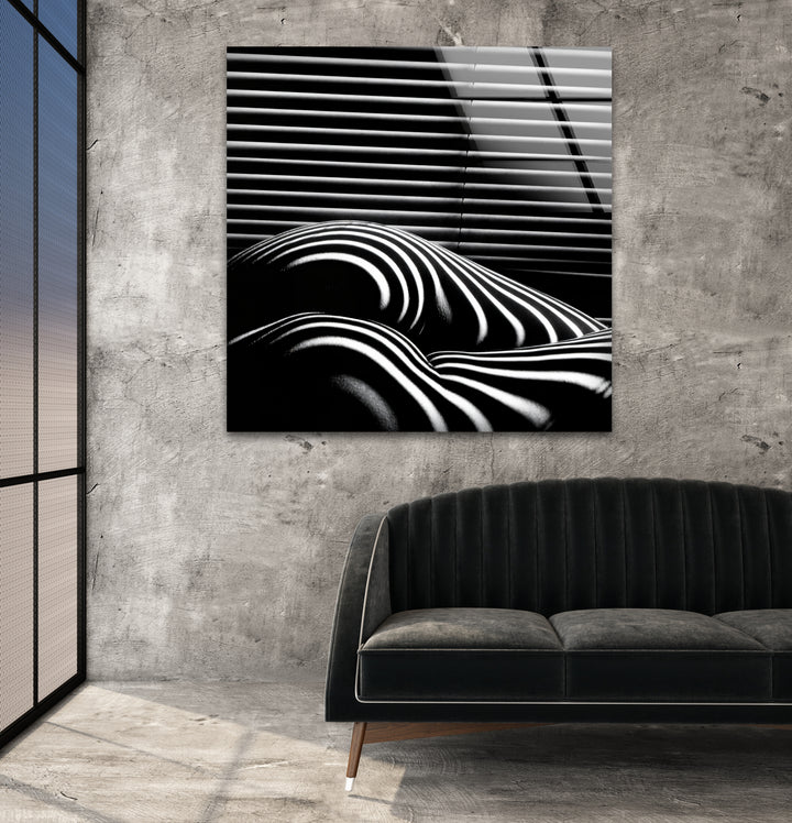 Sophisticated glass wall art with striking erotic nude designs
