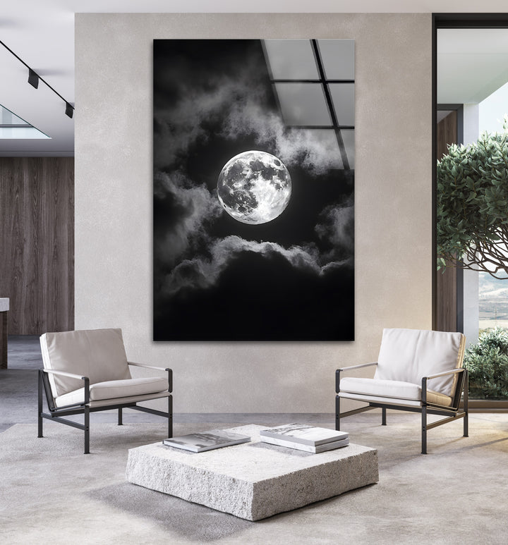 Monochrome moon wall art on glass, with cloud details and intense contrasts, perfect for modern interiors.
