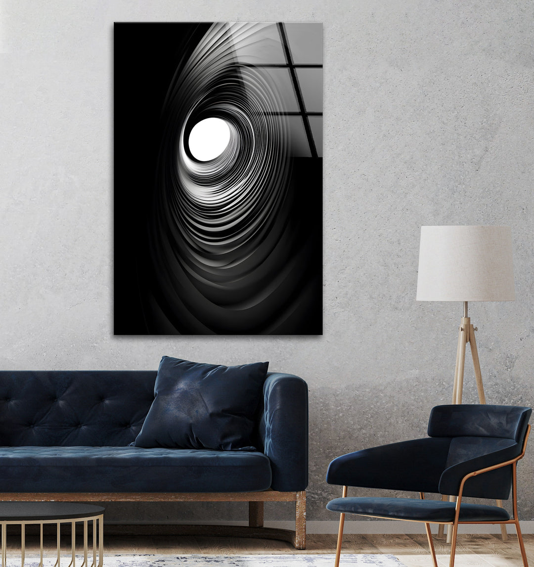 Eye-catching black-and-white spiral design on durable glass, perfect for contemporary interiors.
