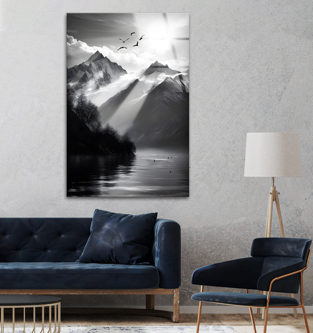 Striking mountain view with sun rays in black-and-white, printed on glass for modern décor.
