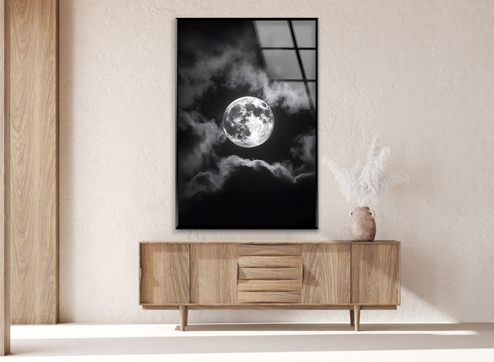 Majestic full moon surrounded by clouds, printed on durable glass for a dramatic effect.
