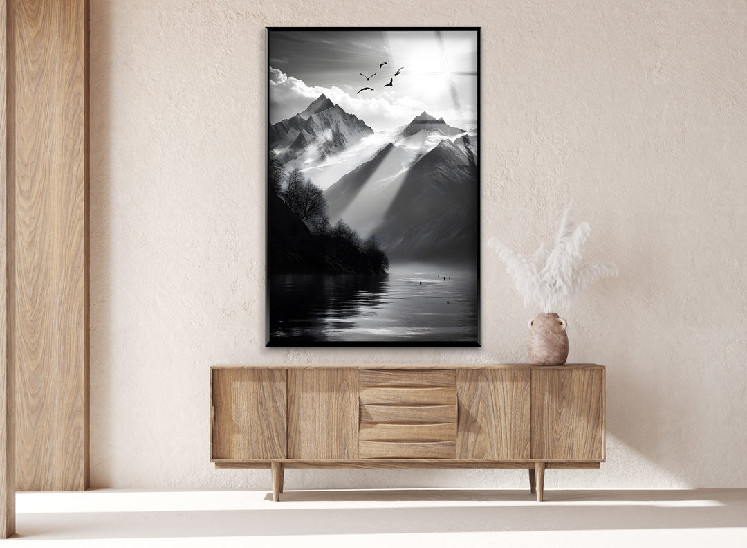 Majestic black-and-white mountain landscape wall art on glass, creating a peaceful ambiance.
